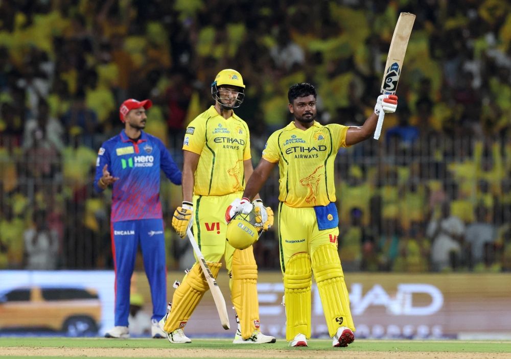  Chennai Super Kings' Sanju Samson celebrates after reaching his century  