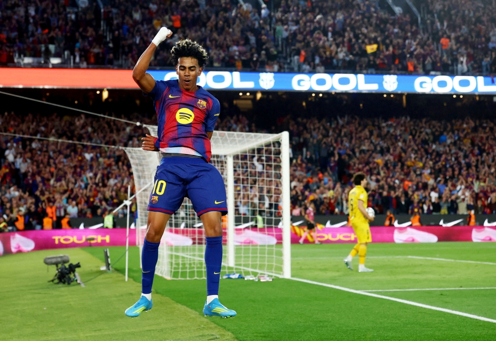  FC Barcelona's Lamine Yamal celebrates scoring their third goal  