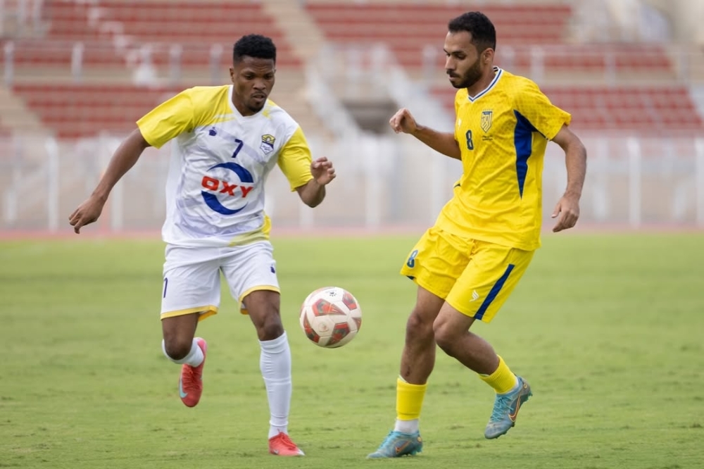 Ibri players in action during their hard-fought victory over Bahla.