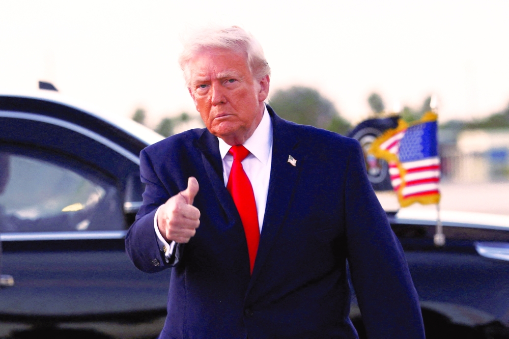 US President Donald Trump arrives at Miami International Airport in Florida. — Reuters