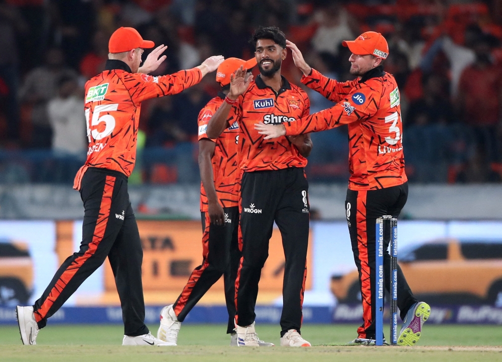 Sunrisers Hyderabad's Praful Hinge celebrates the wicket of Rajasthan Royals' Dhruv Jurel with teammates  
