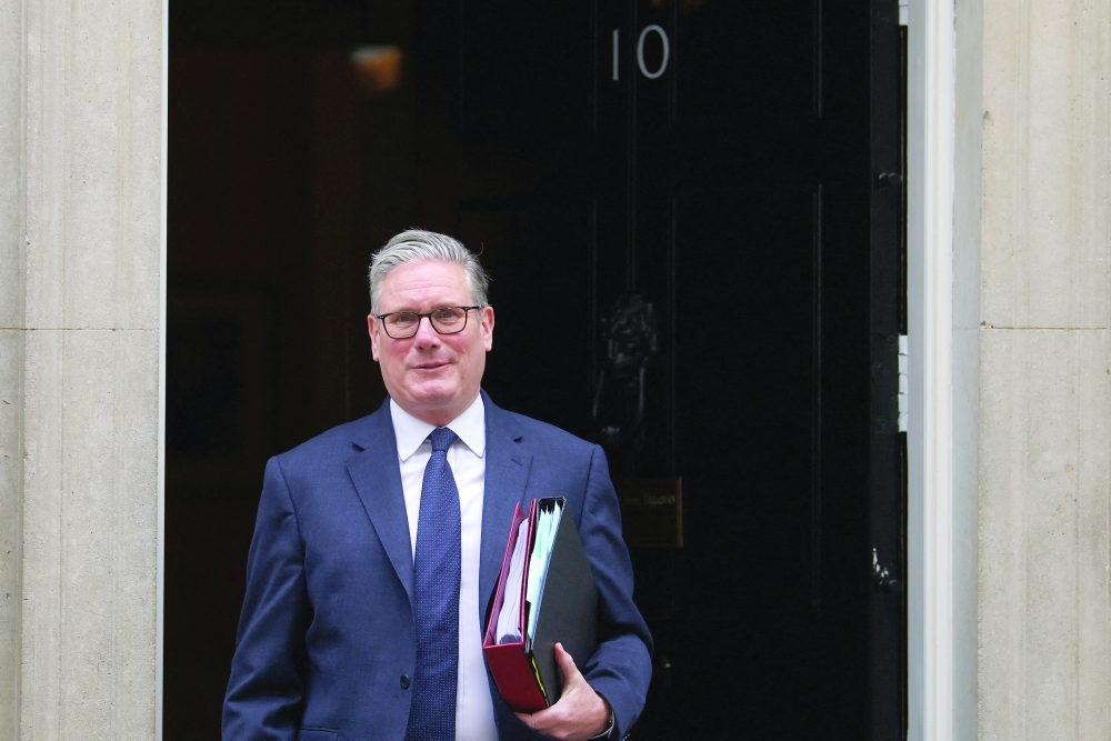 British Prime Minister Keir Starmer walks outside 10 Downing Street, in London. — Reuters 