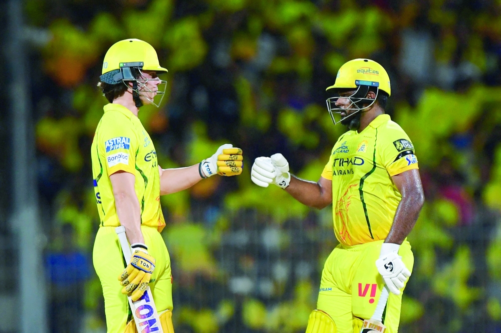 Chennai Super Kings' Sanju Samson and Dewald Brevis interact during the IPL match against Kolkata Knight Riders. — Reuters