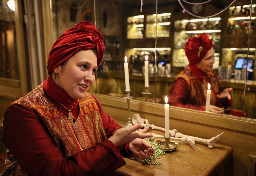 Evgeniya Chassagnard, founder of the voodoo-themed bar Marie Laveau, speaks during an interview in Moscow, Russia February 13, 2026. 