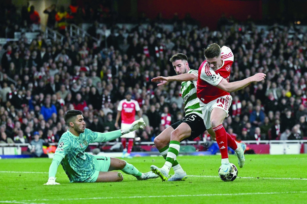 Arsenal's Swedish striker #14 Viktor Gyokeres shoots but fails to score during the Uefa Champions League quarterfinal, second-leg match at the Emirates Stadium in north London. — AFP
