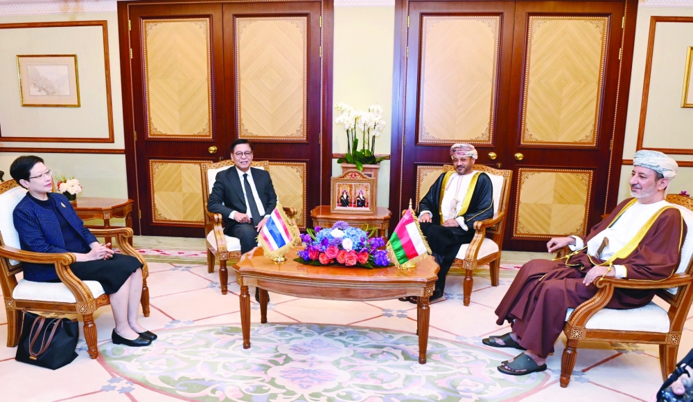 Sayyid Badr bin Hamad al Busaidy with Sihasak Phuangketkeow in Muscat on Thursday.