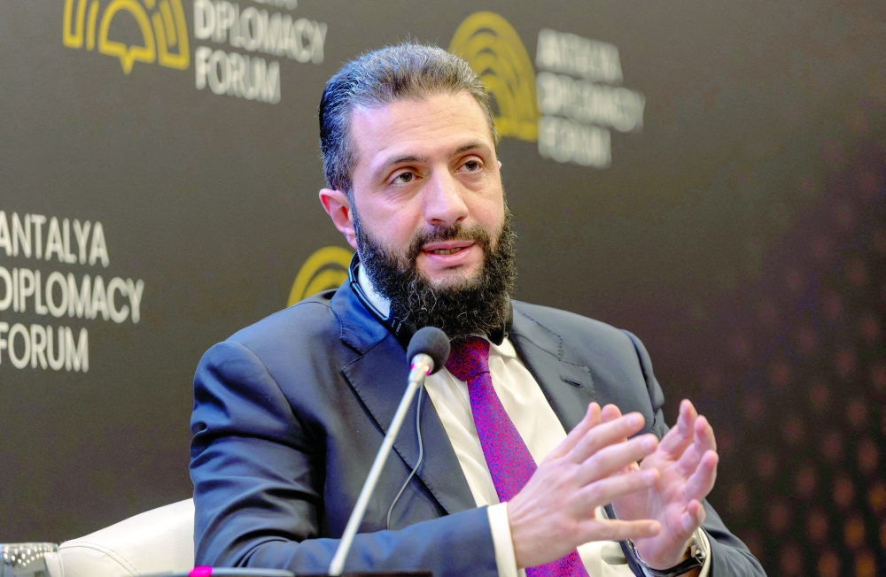 Syrian President Ahmed al Sharaa during a session at Antalya Diplomacy Forum in Antalya, Türkiye. — Reuters