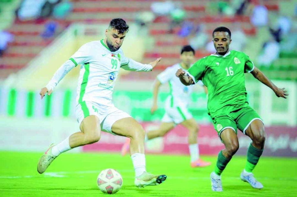 Al Nahda and Sohar players in action.