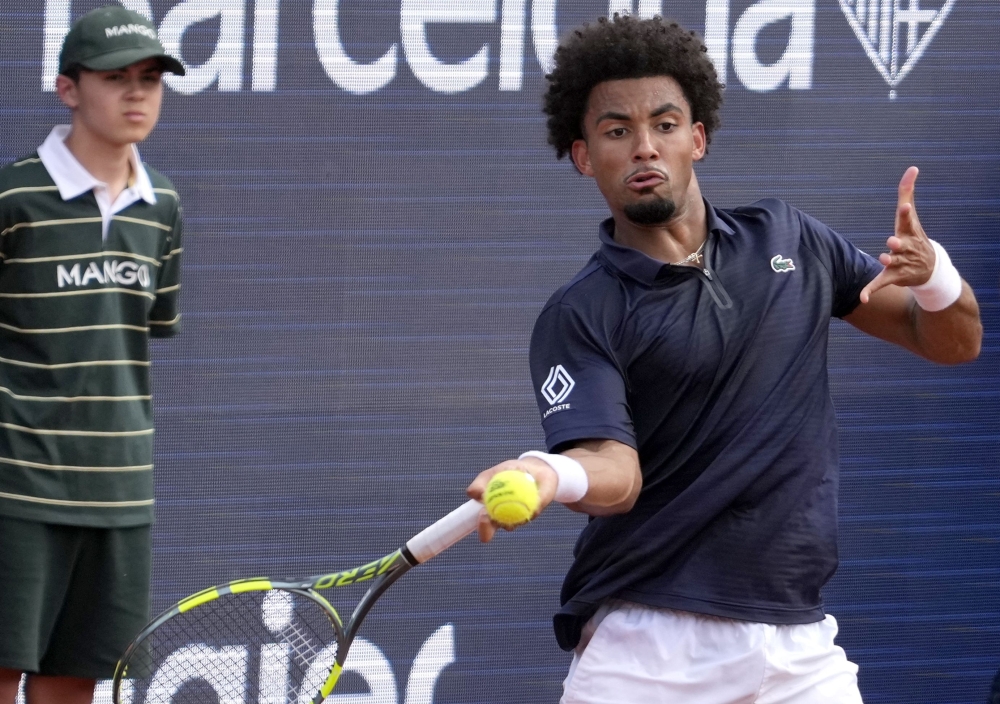France's Arthur Fils returns a shot to Spain's Rafael Jodar during their men singles semi-final match  