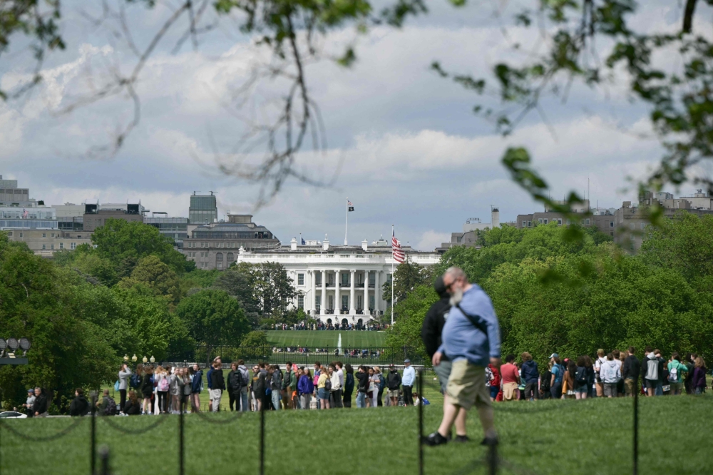 The White House is seen from the National Mall in Washington, DC, on April 19, 2026.  
