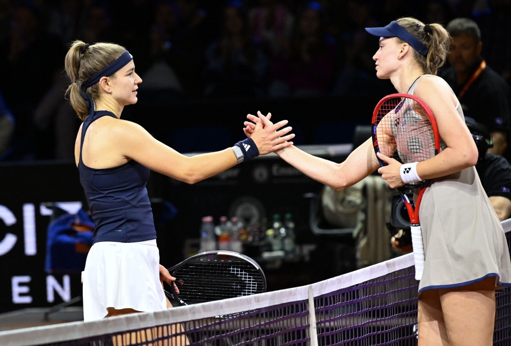 The winner Kazakhstan Elena Rybakina (R) is congratulated by Czech Republic Karolina Muchova 