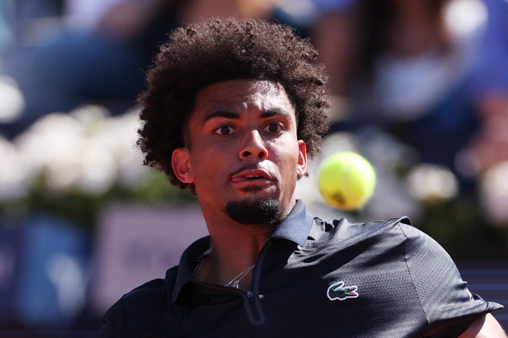  France's Arthur Fils in action during his men's singles final match against Russia's Andrey Rublev  