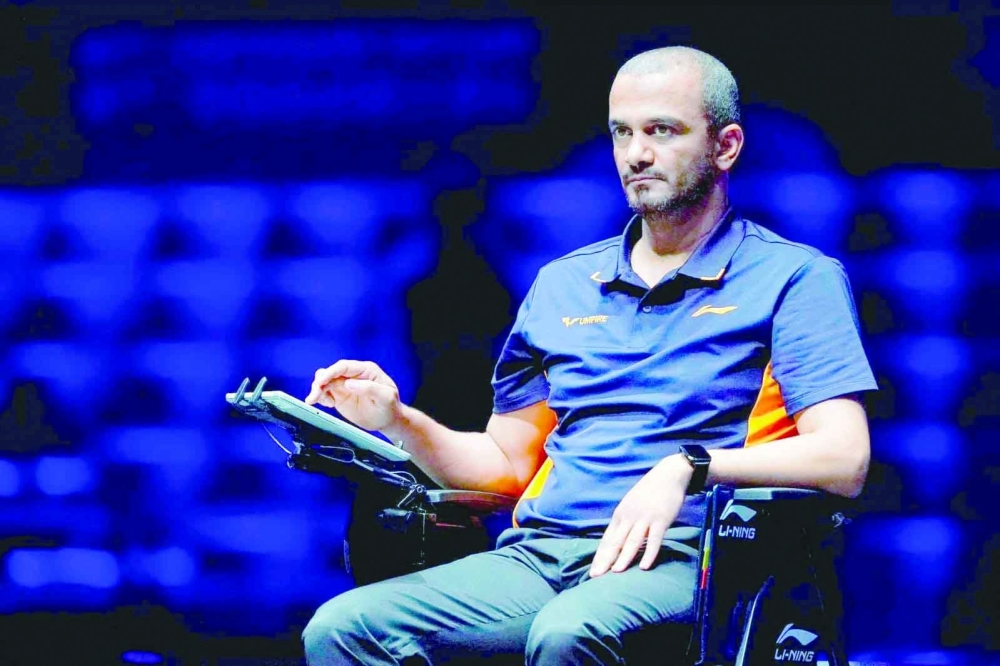 Oman's international TT umpire Mohammed al Alawi officiating a match.