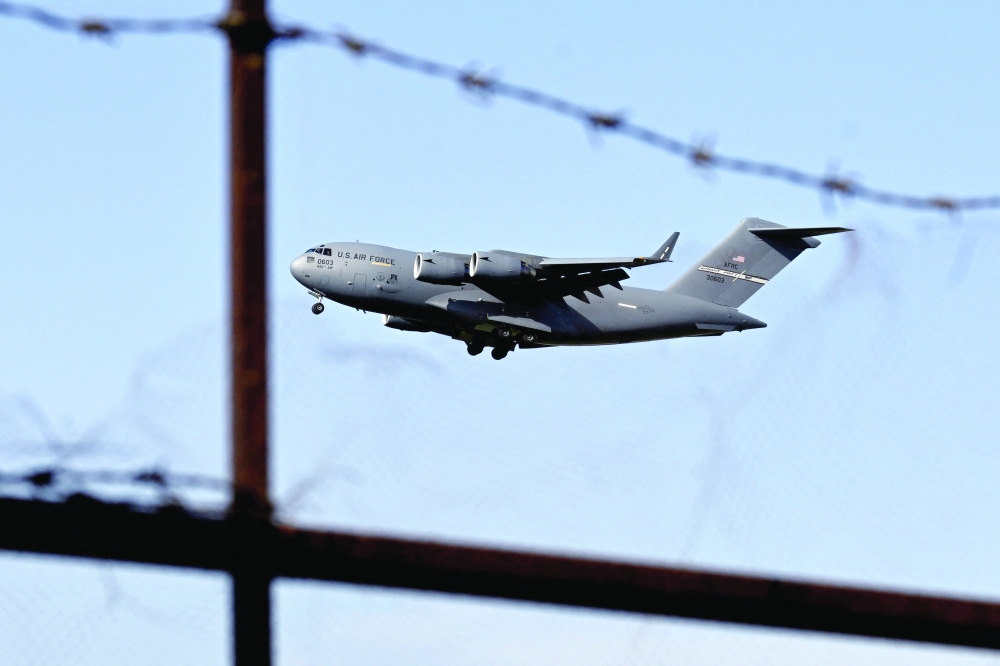 A US Air Force Boeing C-17A Globemaster III aircraft prepares to land at Pakistan's Nur Khan military airbase in Rawalpindi. — AFP