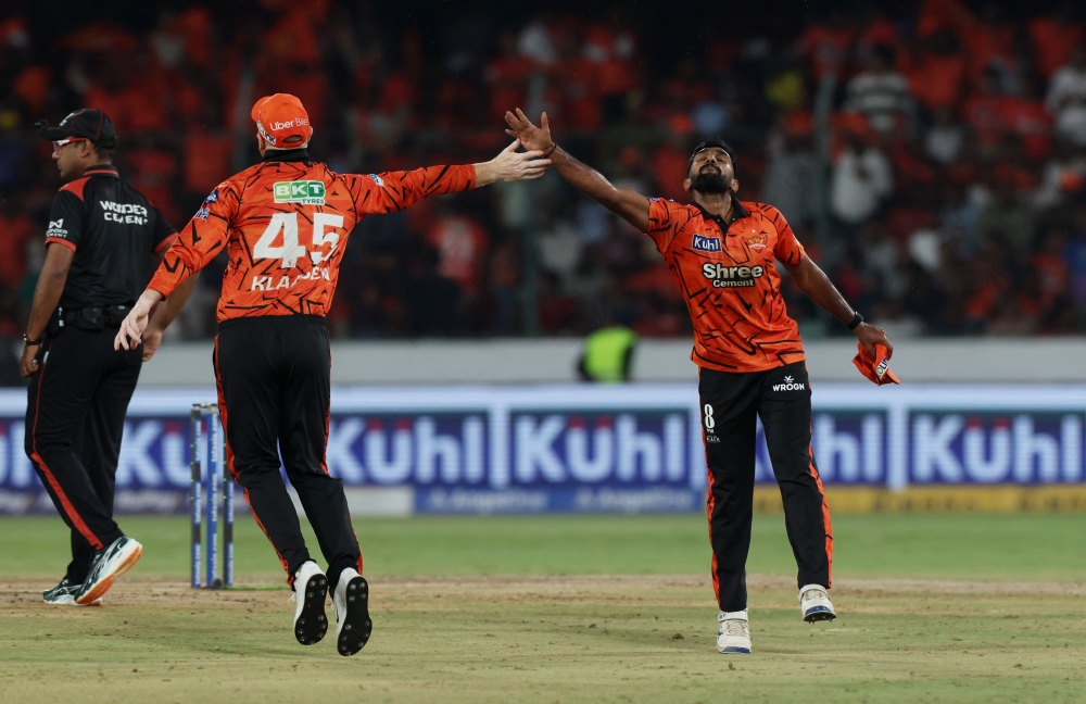  Sunrisers Hyderabad's Eshan Malinga celebrates taking the wicket of Delhi Capitals' Ashutosh Sharma, caught out by Aniket Verma  