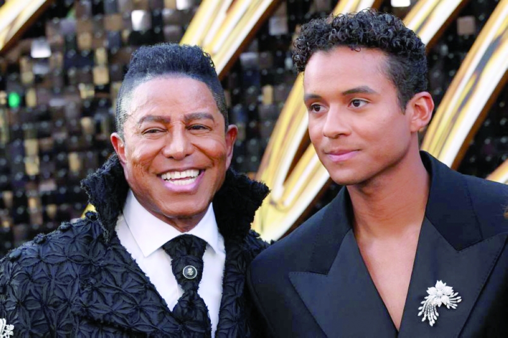 US singer-songwriter Jermaine Jackson and son US actor Jaafar Jackson. — AFP