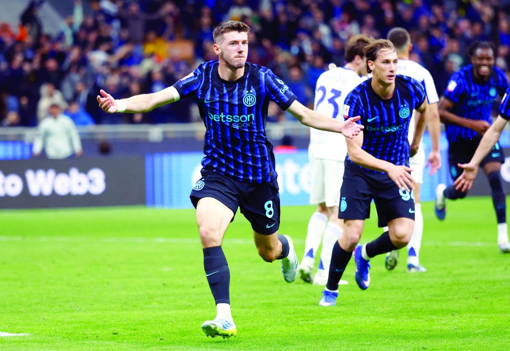 Inter Milan's Petar Sucic celebrates scoring their third goal during the Italian Cup semifinal second-leg match against Como at San Siro, Milan, Italy. — Reuters