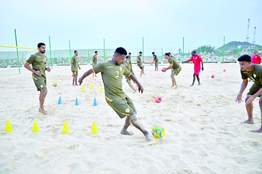 Oman beach soccer team during a training session.