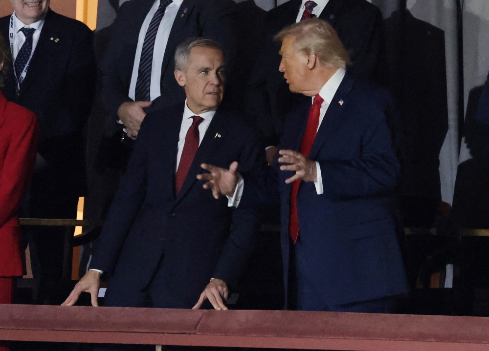  FILE PHOTO: Canada's Prime Minister Mark Carney and U.S. President Donald Trump during the FIFA World Cup 2026 Draw  