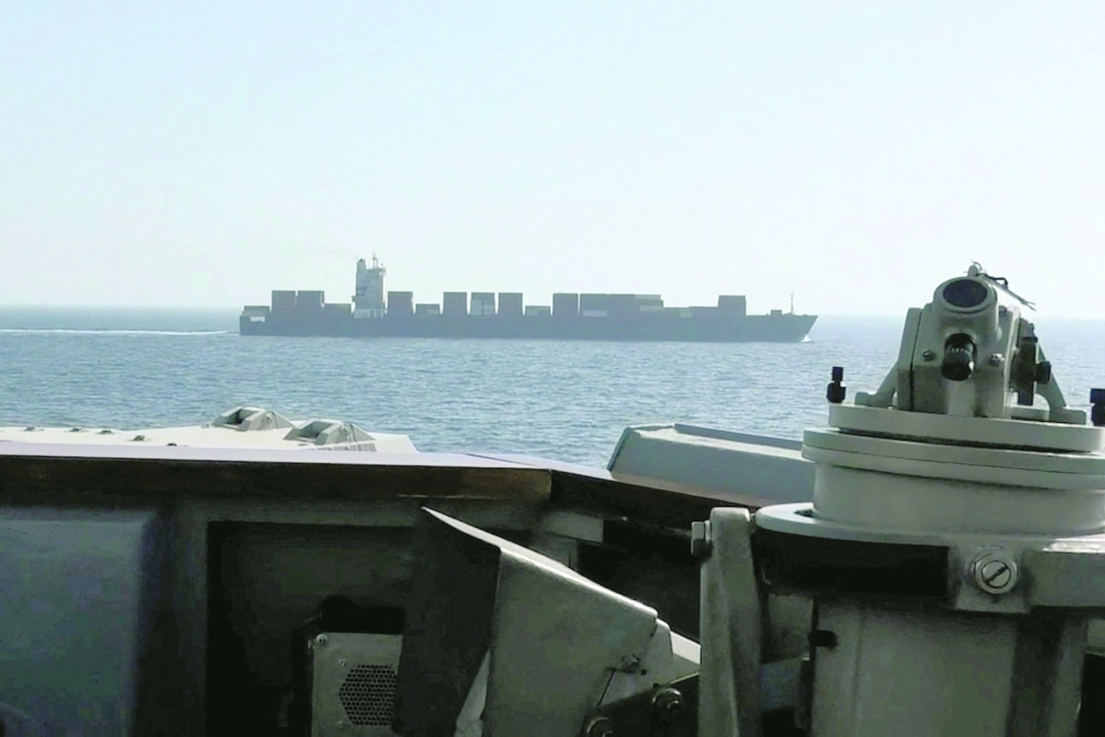 A view of Iranian-flagged cargo ship M/V Touska as the US Navy Arleigh Burke-class Aegis guided missile destroyer USS Spruance conducts its interception in a location given as the north Arabian Sea, in this screen capture from a video. — AFP file photo