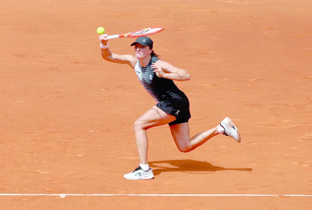 Poland's Iga Swiatek in action during her second round match against Ukraine's Daria Snigur in Madrid. — Reuters