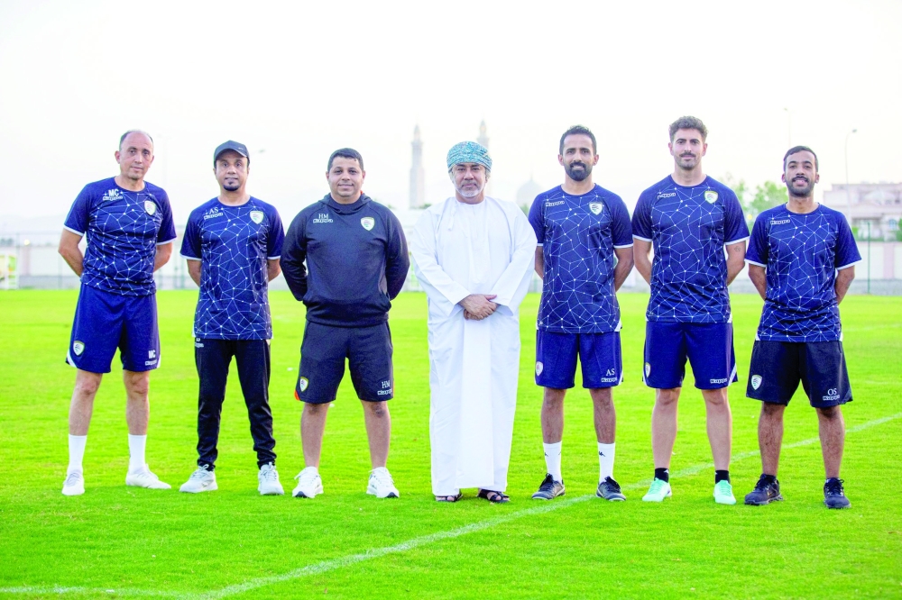 Oman U17 coaching staff with OFA Chairman Sayyid Sulaiman bin Hamood al Busaidy (centre).
