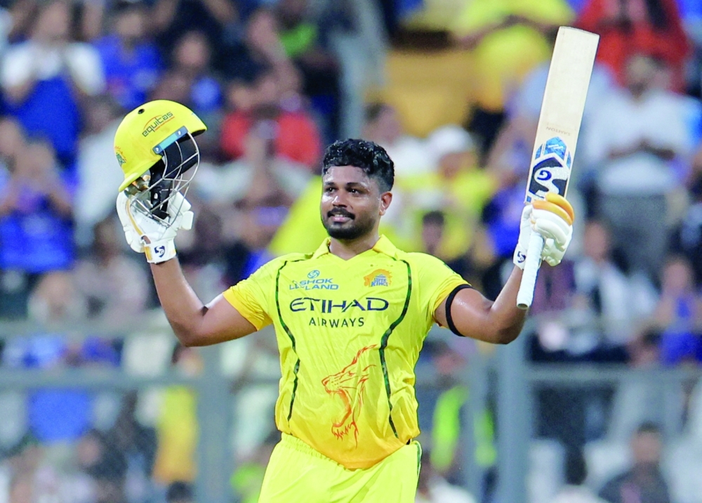 Chennai Super Kings' Sanju Samson celebrates his half century against Mumbai Indians at the Wankhede Stadium in Mumbai. — Reuters