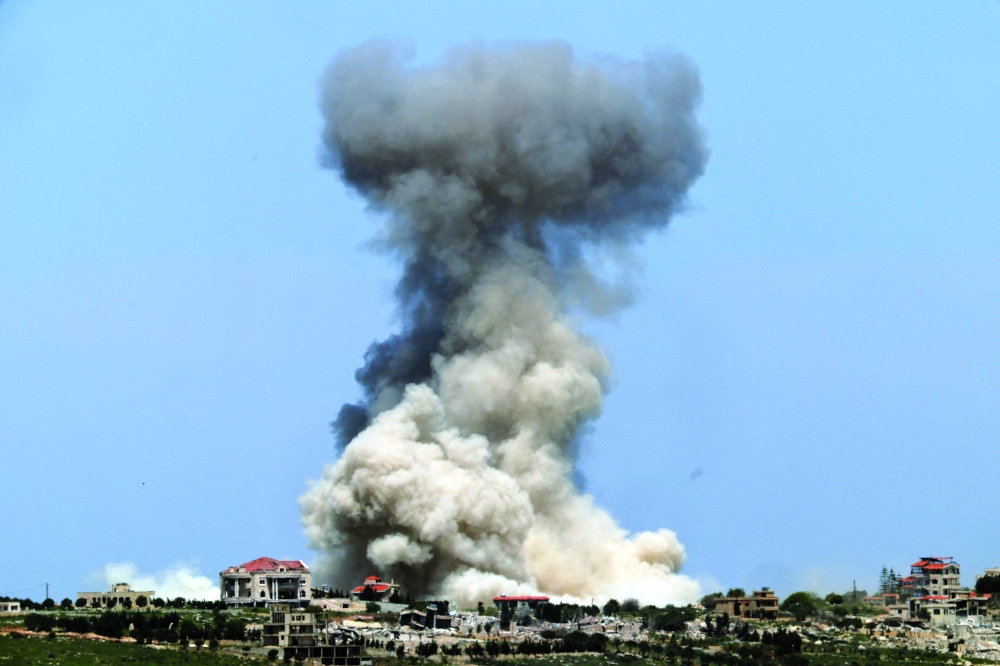 Smoke rises in Lebanon after an explosion, as seen from the Israeli side of border. — Reuters