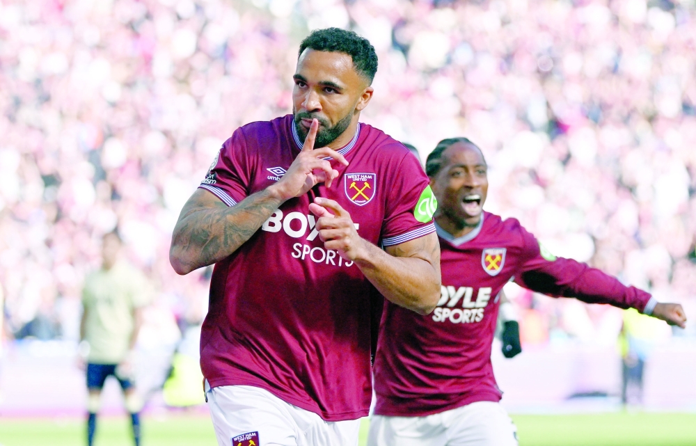 West Ham United's Callum Wilson celebrates scoring their second goal against Everton at the London Stadium. — Reuters