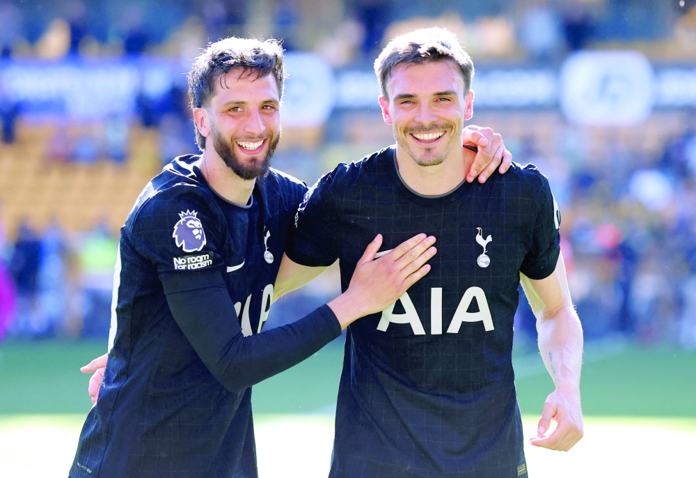 Tottenham Hotspur's Joao Palhinha and Rodrigo Bentancur celebrate after the match against Wolverhampton Wanderers. — Reuters