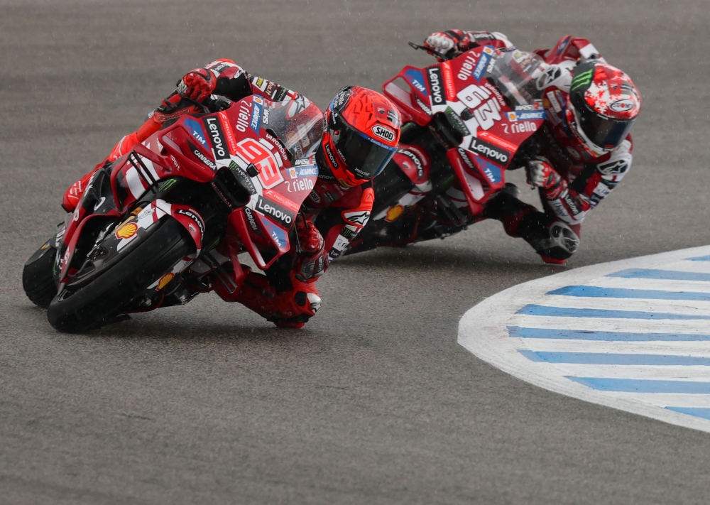 Team Ducati Lenovo Team's Marc Marquez rides ahead of Team Ducati Lenovo Team's Francesco Bagnaia during the MotoGP Spanish Grand Prix sprint race  
