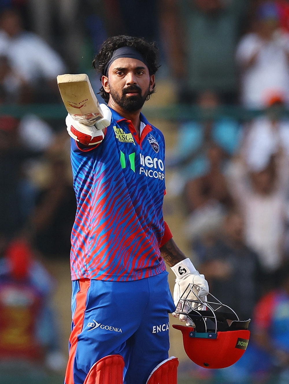   Delhi Capitals' KL Rahul celebrates after completing his century  