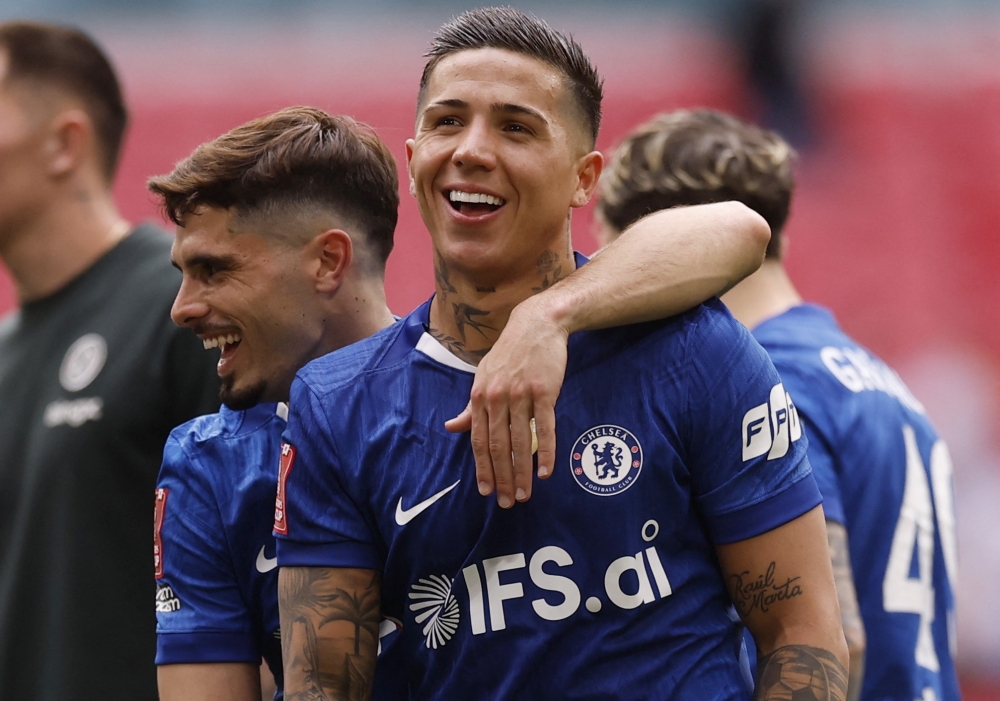   Chelsea's Pedro Neto and Enzo Fernandez celebrate after the match  