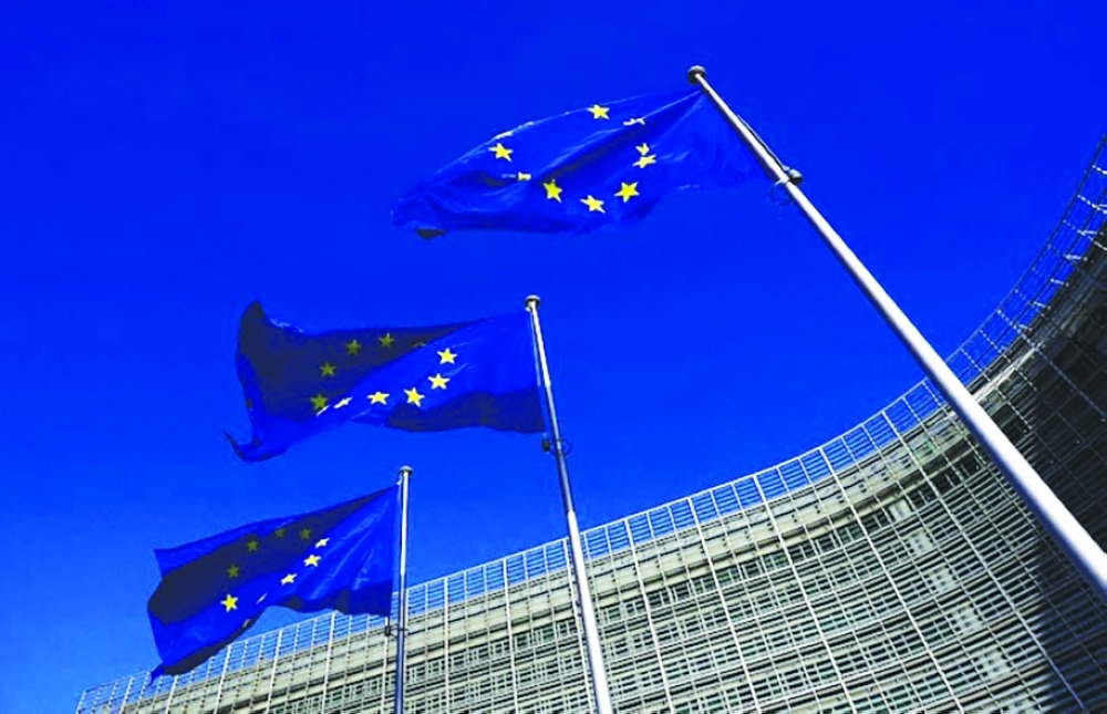 European Union flags flutter outside the European Commission headquarters in Brussels, Belgium. — Reuters