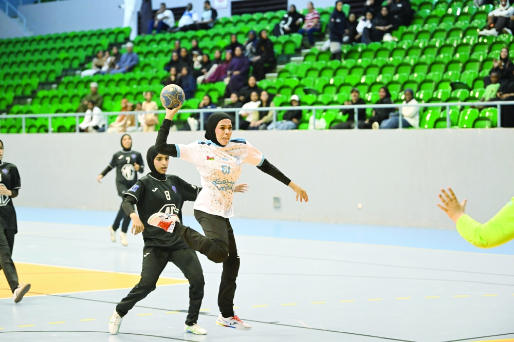 A Masirah attacker breaks through Al Amerat’s defence during the final, showcasing the champions’ attacking strength. —  Abdulwahid al Hamadani