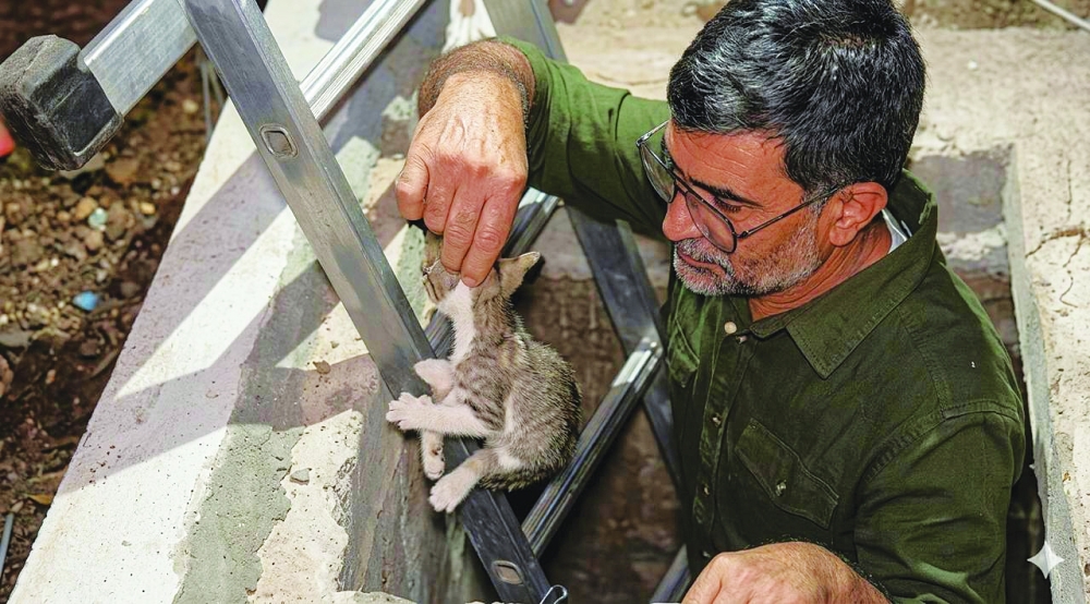 Mohammed Shakir carried out a rescue after saving a mother cat and her kittens.