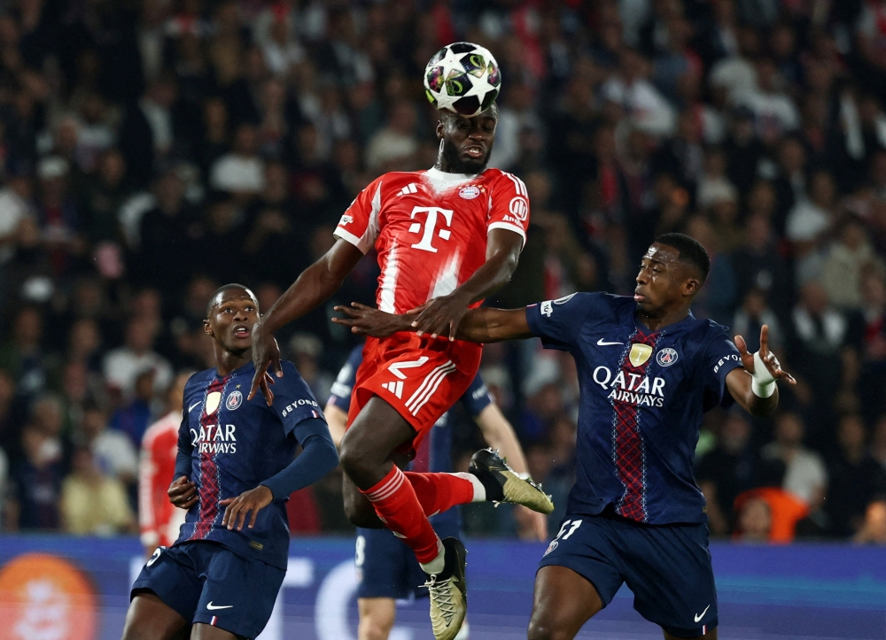  Bayern Munich's Dayot Upamecano scores their third goal  