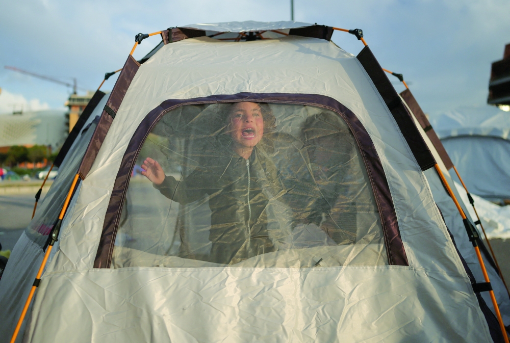 A displaced girl at a makeshift encampment amid a temporary ceasefire between Lebanon and Israel, in Beirut. — Reuters