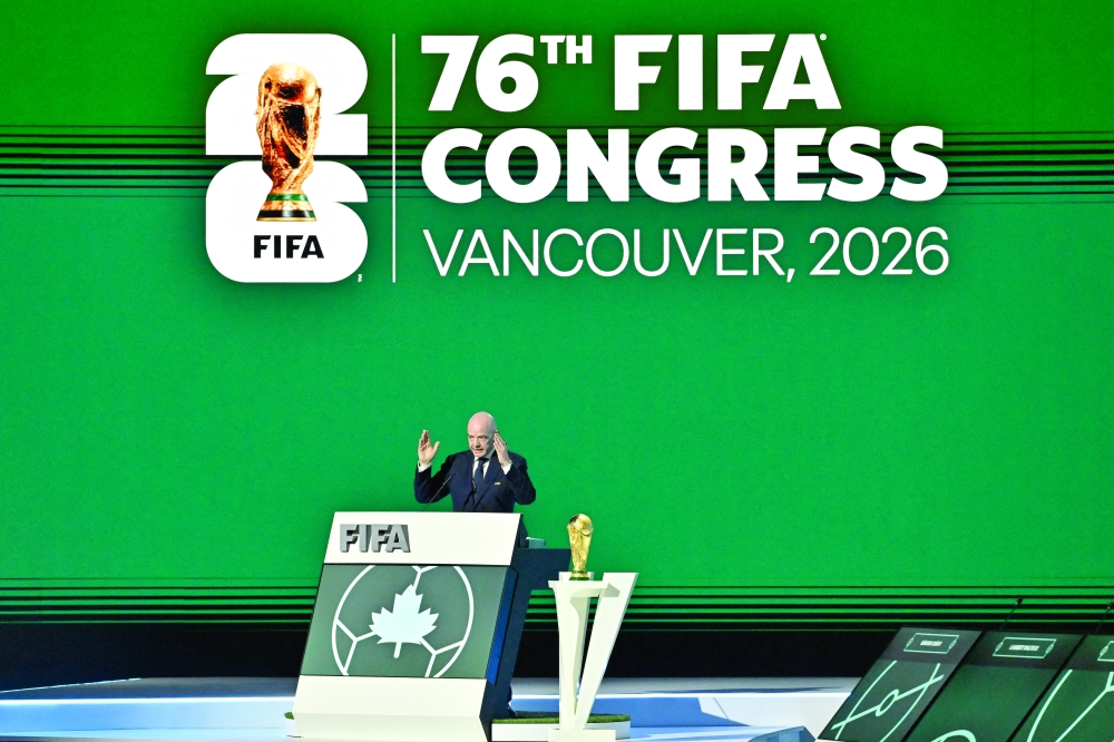 FIFA President Gianni Infantino speaks during the congress as the FIFA World Cup Trophy is seen REUTERS