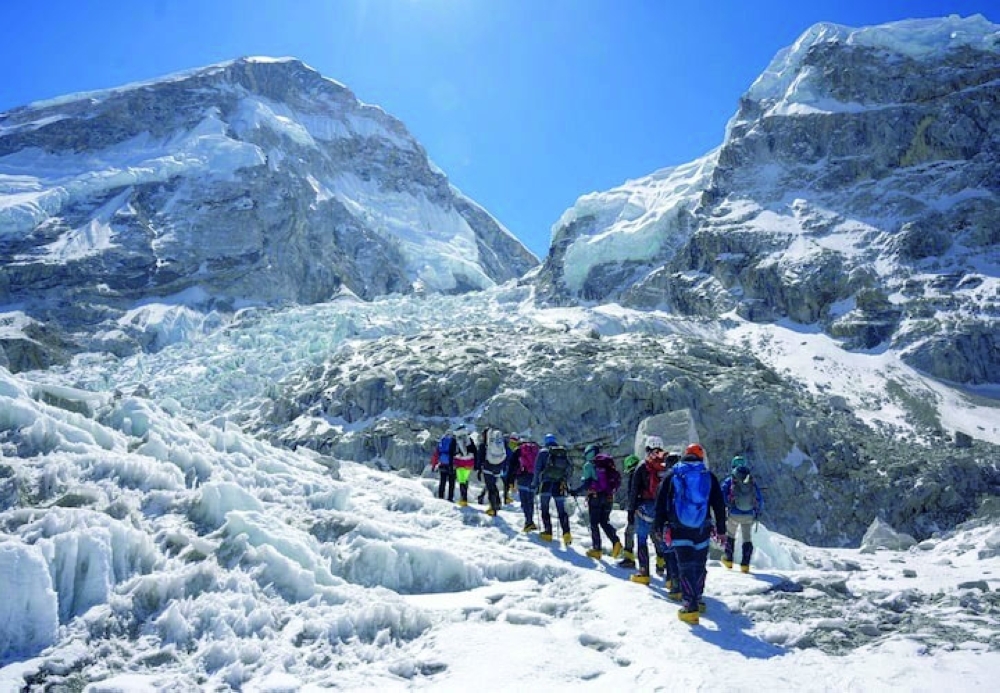 Members of an expedition team hike through Khumbu Icefall, as the route to Mount Everest Camp One has not yet been opened for the season in Solukhumbu district, also known as the Everest region, Nepal. — Reuters