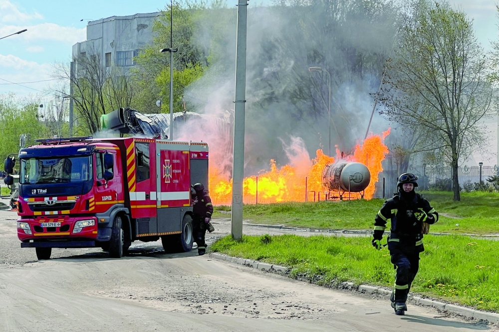 Firefighters arrive to the site of a fuel station which was hit by a Russian drone strike, in Kharkiv, Ukraine. — Reuters 