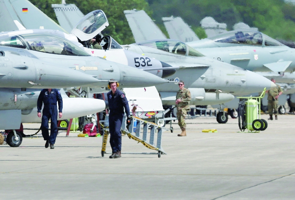 Combat aircrafts stand in front of a hangar at the American military's Ramstein Air Base, Germany. — Reuters 