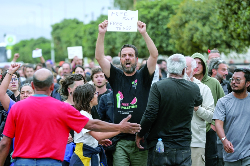 Members of the Global Sumud Flotilla vessels, intercepted by the Israeli Navy in international waters, demonstrate in the town of Ierapetra in the island of Crete, Greece, on May 1, 2026. 