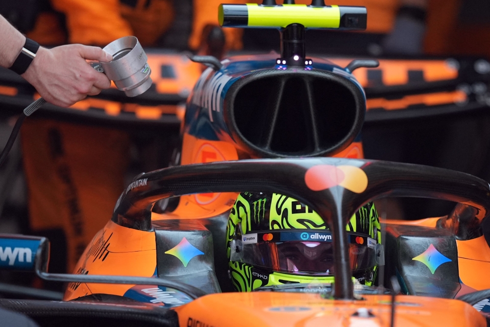 McLaren's British driver Lando Norris waits in the garage during the qualifying session 