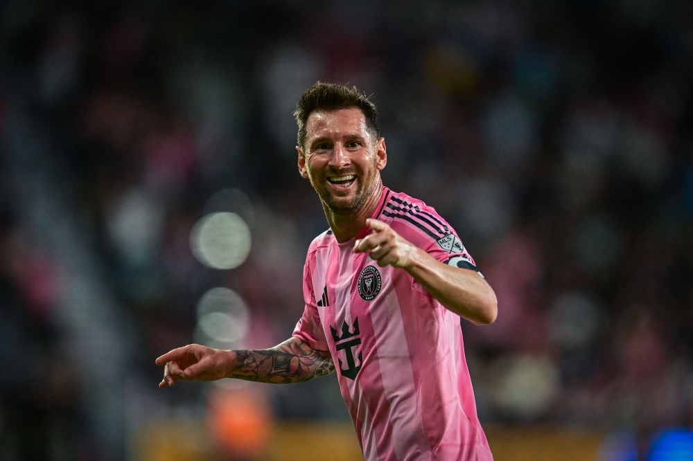 Inter Miami's Argentine forward #10 Lionel Messi celebrates a goal 

