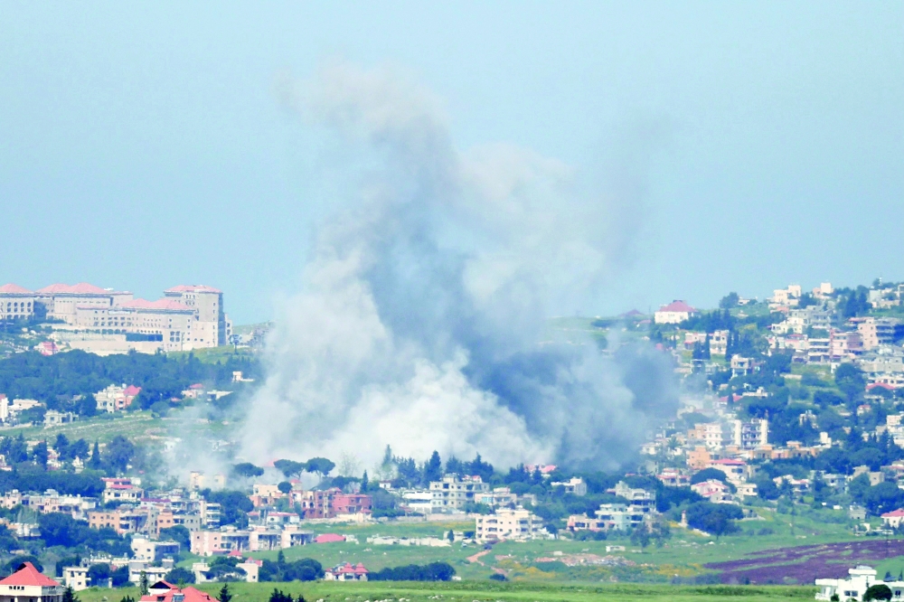 Smoke rises from the site of an Israeli air strike that targeted the southern Lebanese village of Mayfadoun. — AFP