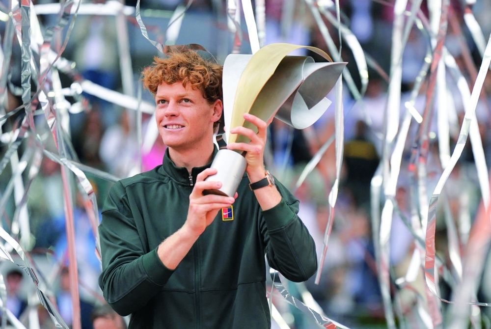 Italy's Jannik Sinner celebrates with the Madrid Open trophy after winning the men's final against Germany's Alexander Zverev. — Reuters
