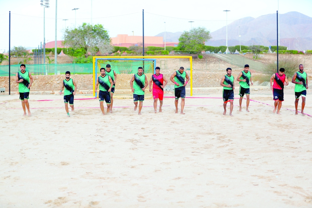 Oman beach handball team during a training session.