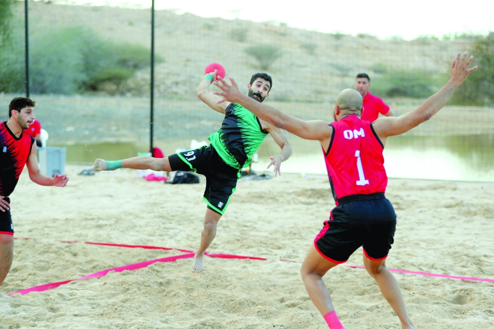 Oman beach handball team during a training session.