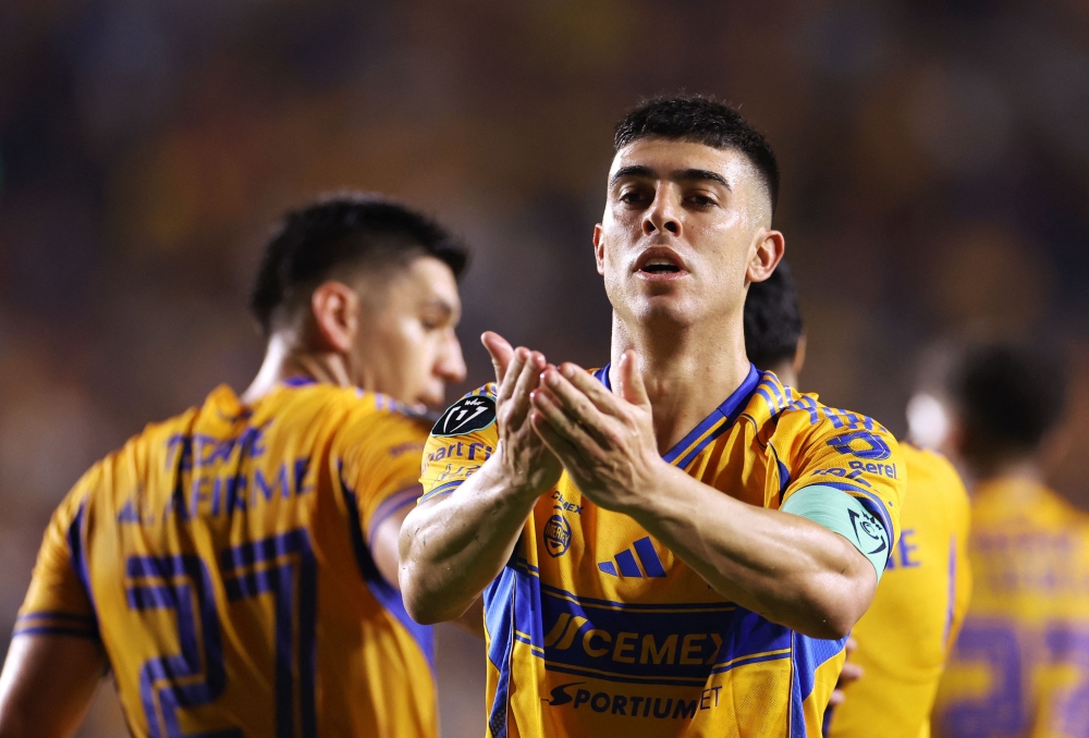 Tigres' Argentine midfielder #11 Juan Brunetta celebrates after scoring the opening goal during the CONCACAF Champions Cup semifinal second leg  